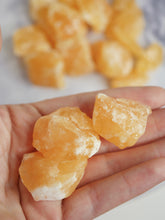 Load image into Gallery viewer, Orange Calcite rough chunks
