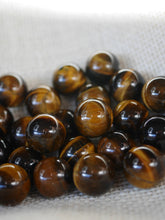 Load image into Gallery viewer, Mini Tiger Eye spheres
