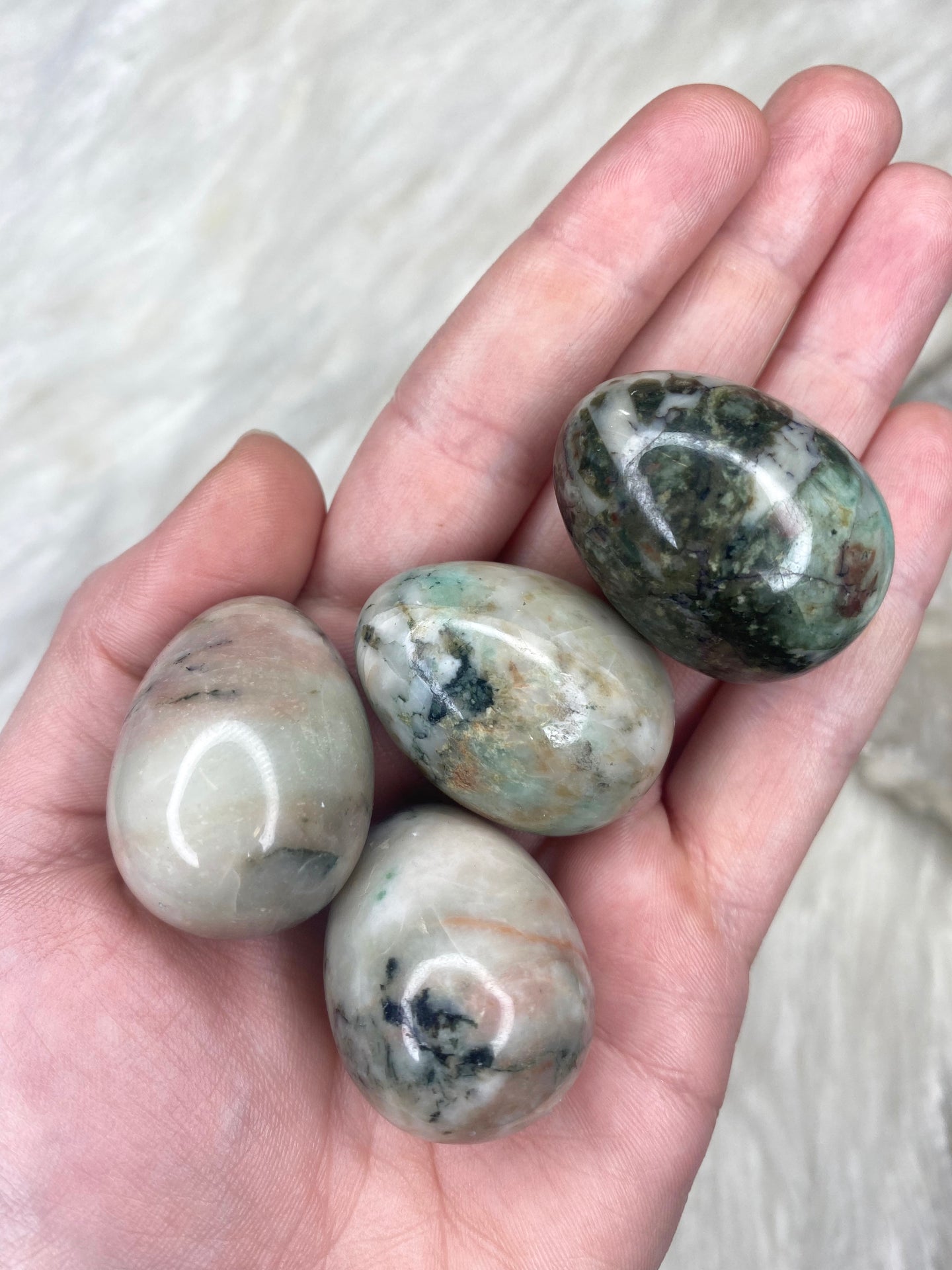 Emerald In Quartz Egg Carving
